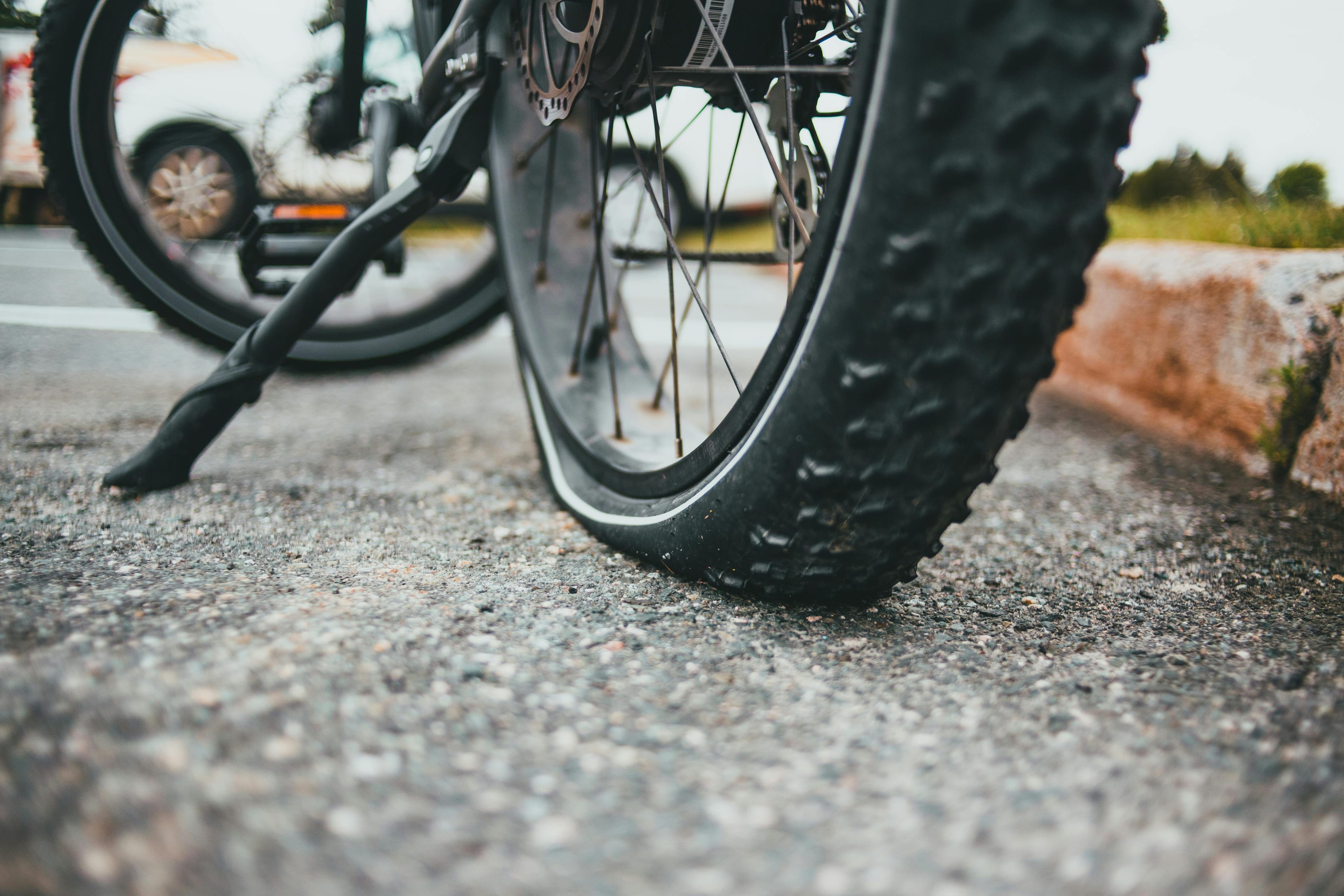 Cyclist with a flat bike tire
